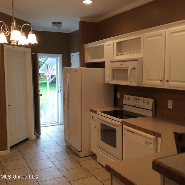 kitchen featuring pendant lighting, an inviting chandelier, light tile patterned floors, white cabinetry, and white appliances