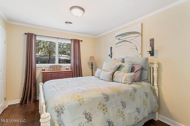 bedroom with ornamental molding and dark wood-type flooring