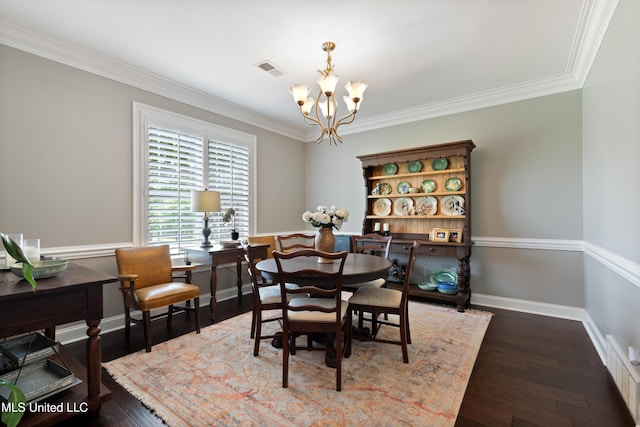 2038 Nottaway Dr, Southaven, MS 38672 - dining area with a chandelier, ornamental molding, wood finished floors, and baseboards