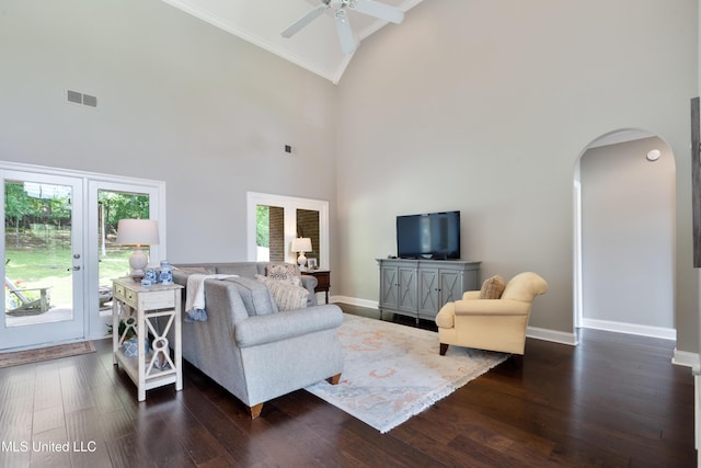 2038 Nottaway Dr, Southaven, MS 38672 - living room featuring arched walkways, french doors, high vaulted ceiling, dark wood-style floors, and ceiling fan