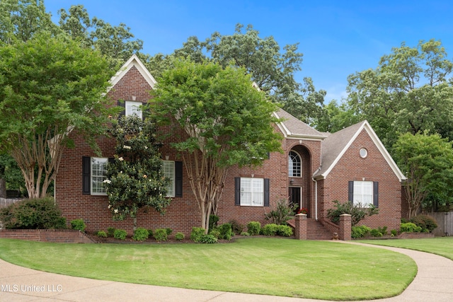 2038 Nottaway Dr, Southaven, MS 38672 - view of front facade featuring brick siding and a front lawn