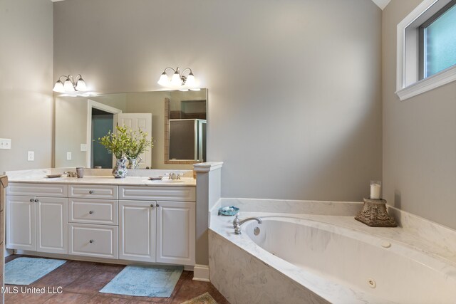 2038 Nottaway Dr, Southaven, MS 38672 - full bath with a bath, double vanity, a stall shower, and tile patterned flooring