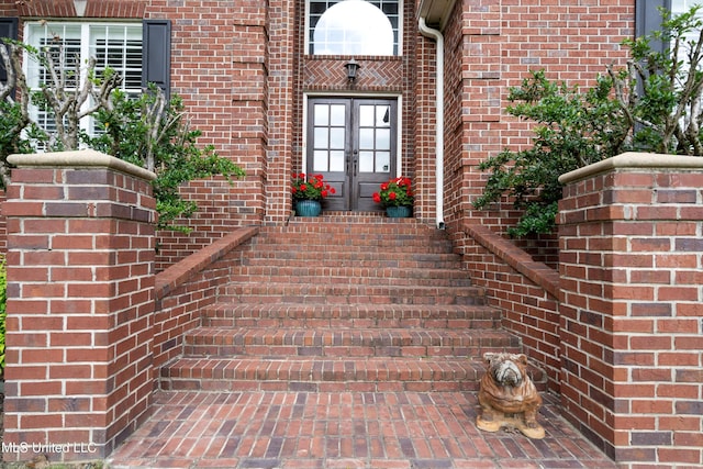2038 Nottaway Dr, Southaven, MS 38672 - view of exterior entry with french doors and brick siding
