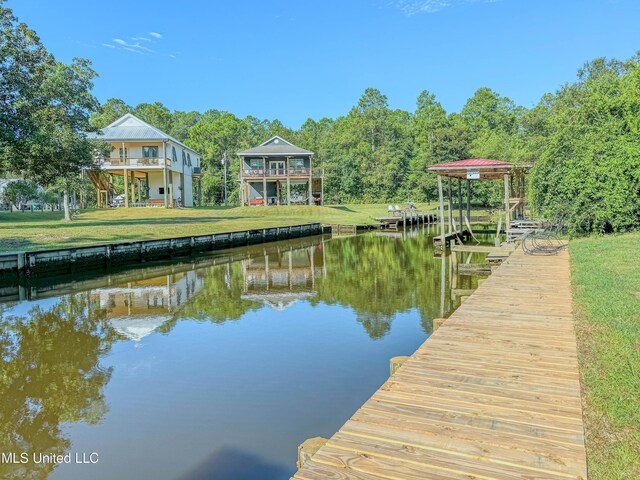 6085 Apache Dr, Kiln, MS 39556 - dock area featuring a lawn and a water view