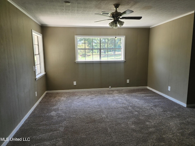 carpeted empty room with ornamental molding, a textured ceiling, and ceiling fan