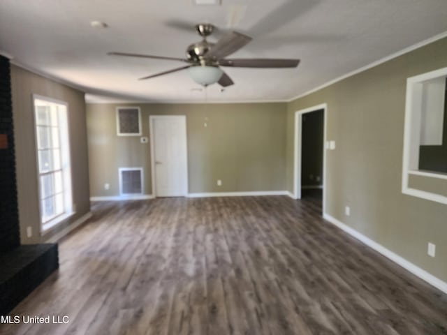 unfurnished living room with ornamental molding, ceiling fan, and dark hardwood / wood-style flooring