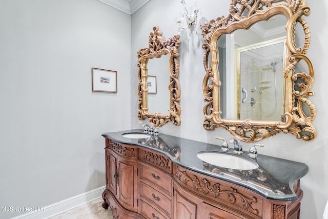 bathroom with a shower with door, crown molding, and vanity