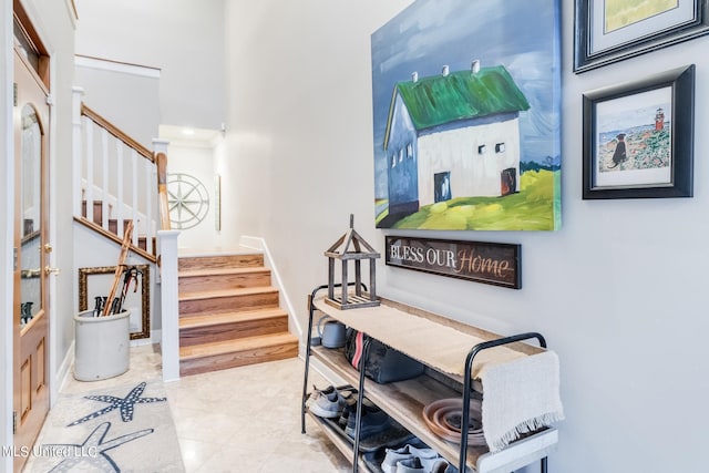 staircase featuring hardwood / wood-style flooring