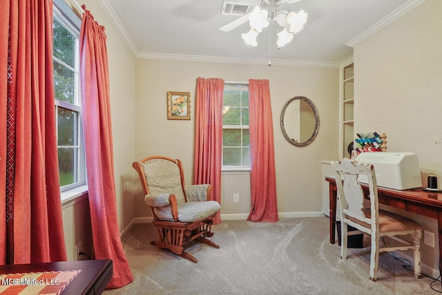 office area featuring visible vents, a ceiling fan, carpet, crown molding, and baseboards