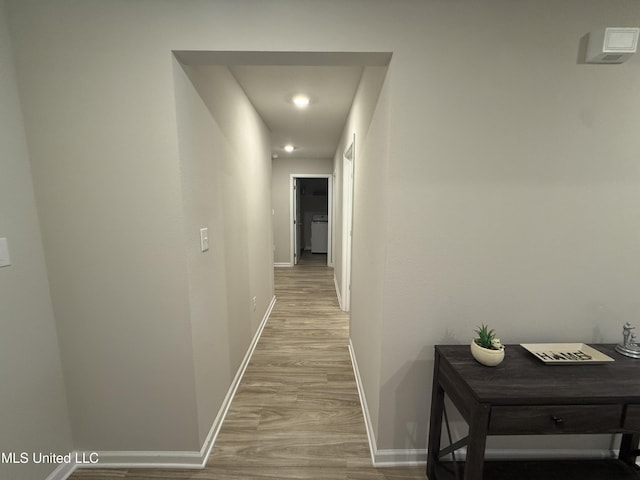 corridor featuring light wood-type flooring