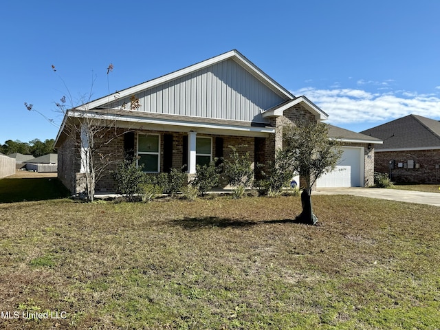 view of front facade featuring a garage and a front lawn