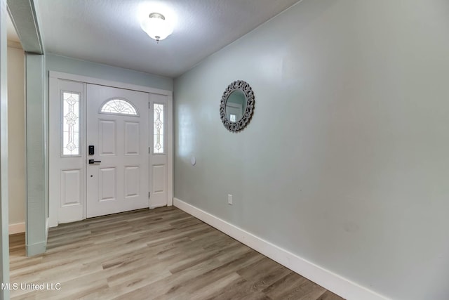 foyer featuring light hardwood / wood-style flooring