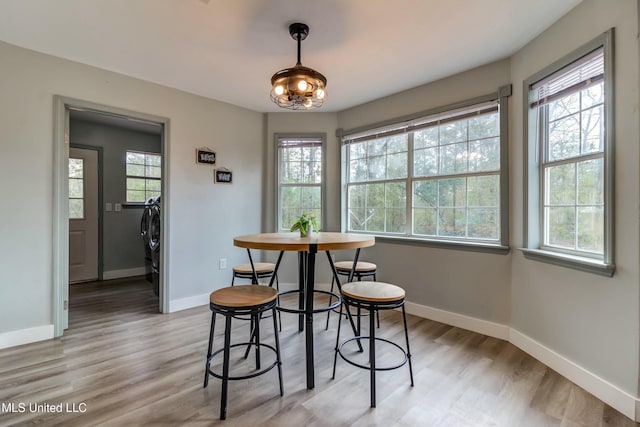 dining room featuring light hardwood / wood-style floors