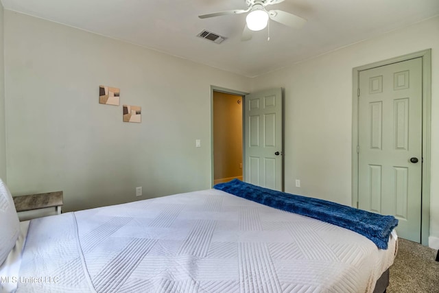 bedroom with ceiling fan and carpet floors