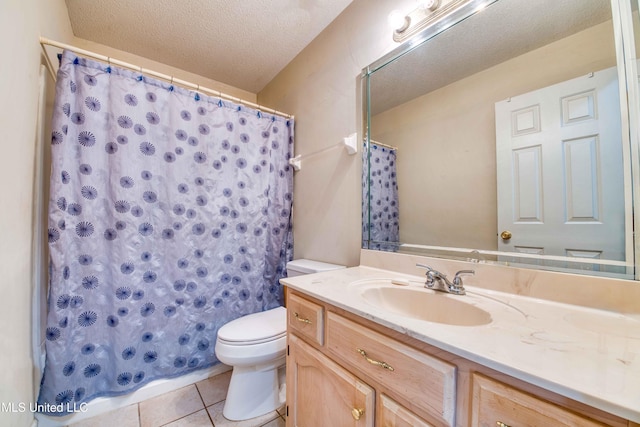 7643 Broken Hickory Dr, Walls, MS 38680 - full bath with vanity, toilet, tile patterned floors, a textured ceiling, and a shower with shower curtain