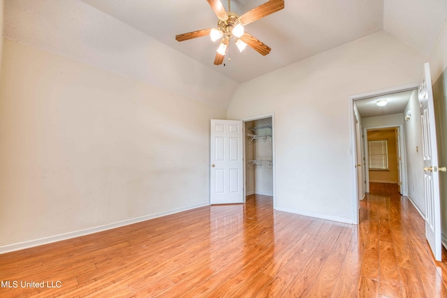 7643 Broken Hickory Dr, Walls, MS 38680 - unfurnished bedroom featuring lofted ceiling, light wood-type flooring, baseboards, a closet, and ceiling fan