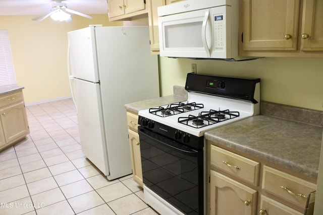 kitchen featuring white appliances, a ceiling fan, light tile patterned floors, and light brown cabinets