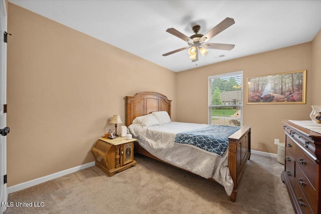 bedroom with carpet floors, baseboards, and ceiling fan