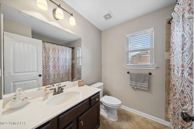 full bathroom with toilet, tile patterned flooring, vanity, baseboards, and a shower with curtain