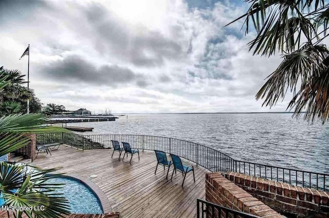 view of dock with a water view