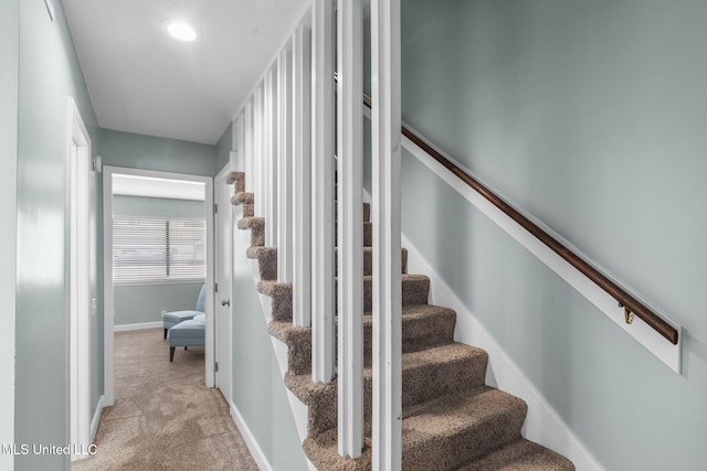 stairway featuring baseboards, carpet flooring, and recessed lighting