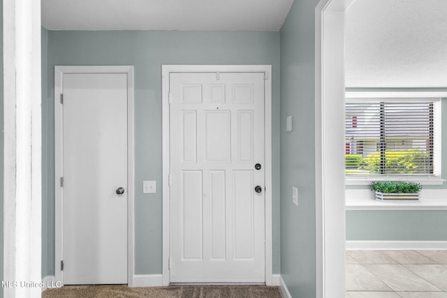 foyer with baseboards