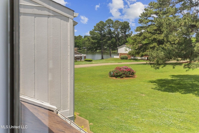 view of yard with a water view