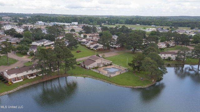 birds eye view of property featuring a water view and a residential view
