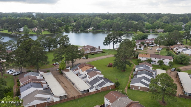 birds eye view of property with a water view and a residential view