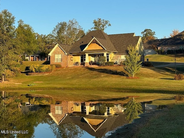 4 Mallard Xing, Raymond, MS 39154 - view of front facade with a front lawn
