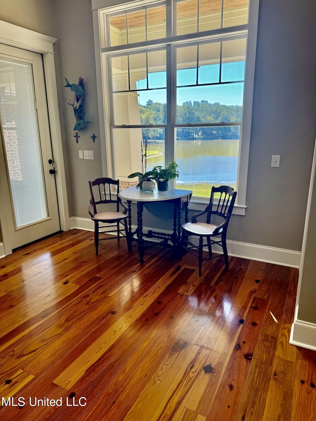 4 Mallard Xing, Raymond, MS 39154 - sitting room featuring hardwood / wood-style flooring, baseboards, and a water view