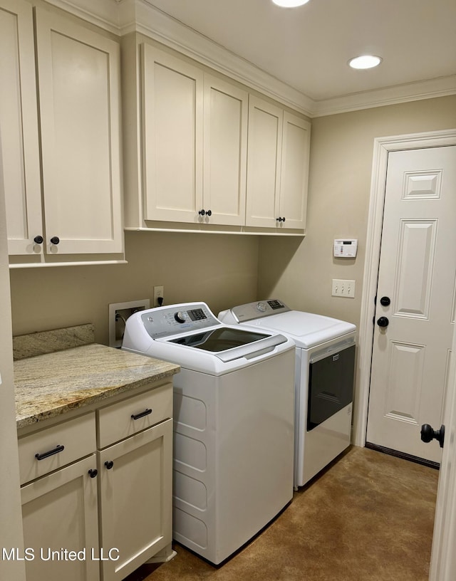 4 Mallard Xing, Raymond, MS 39154 - washroom with washer and clothes dryer, cabinet space, dark carpet, and ornamental molding