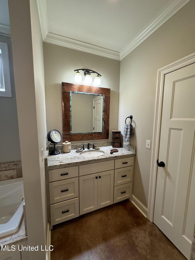 4 Mallard Xing, Raymond, MS 39154 - bathroom with crown molding, vanity, and a bath
