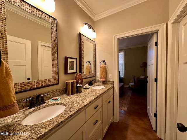 bathroom featuring vanity and ornamental molding