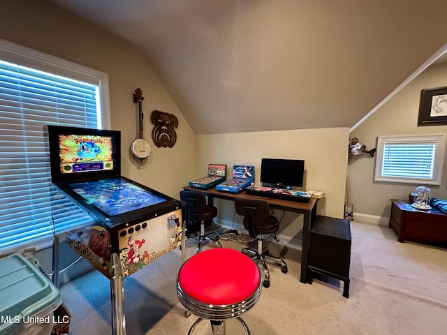 office space featuring lofted ceiling and carpet flooring