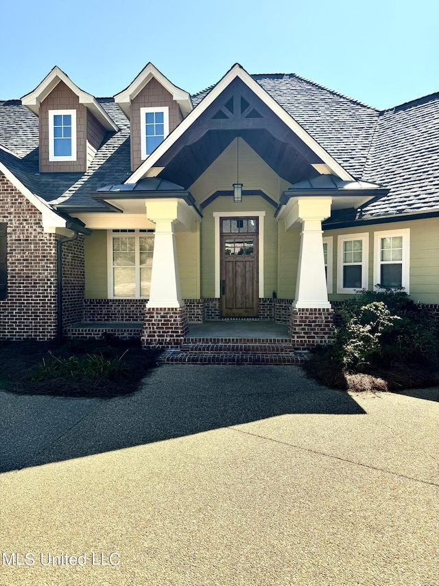 4 Mallard Xing, Raymond, MS 39154 - view of front facade featuring brick siding
