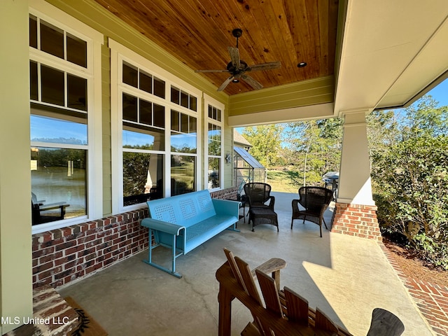 view of patio featuring ceiling fan and an outdoor living space