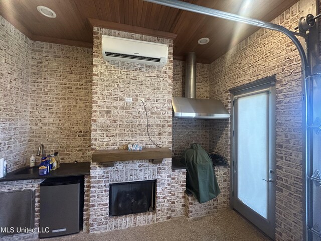 1306 Robert E Lee Dr, Greenwood, MS 38930 - unfurnished living room featuring a wall mounted air conditioner, wood ceiling, a fireplace, and brick wall