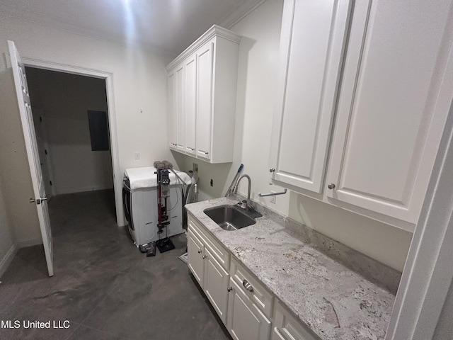 1306 Robert E Lee Dr, Greenwood, MS 38930 - laundry room featuring cabinet space