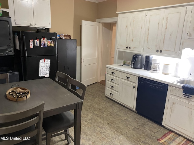 kitchen with white cabinetry, sink, black appliances, and ornamental molding