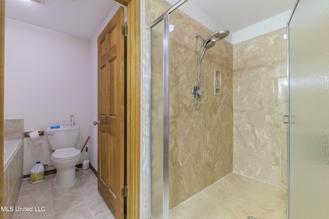 bathroom featuring an enclosed shower and toilet