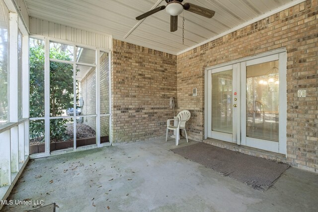 view of patio featuring ceiling fan and french doors