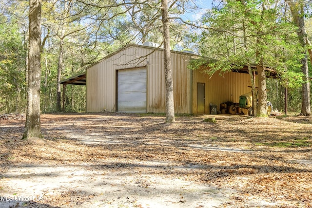 view of outdoor structure with a garage