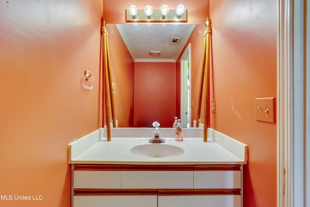 bathroom featuring vanity and crown molding