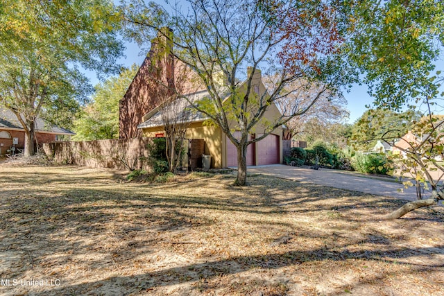 view of front of home with a garage