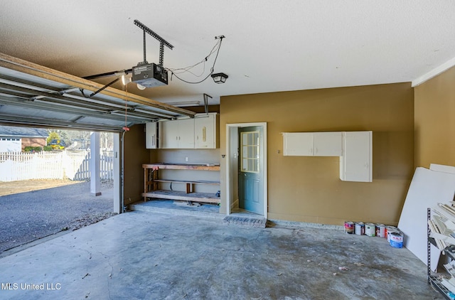 garage featuring a garage door opener