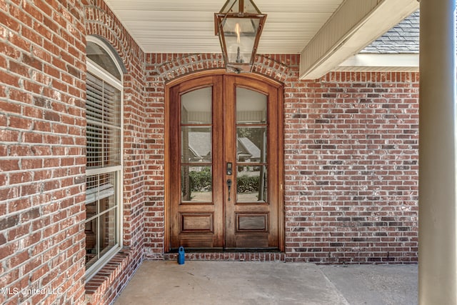 property entrance featuring french doors