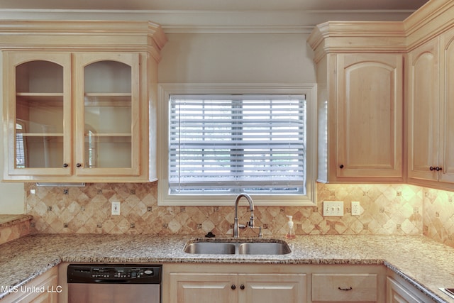 kitchen with dishwasher, decorative backsplash, ornamental molding, sink, and light stone countertops