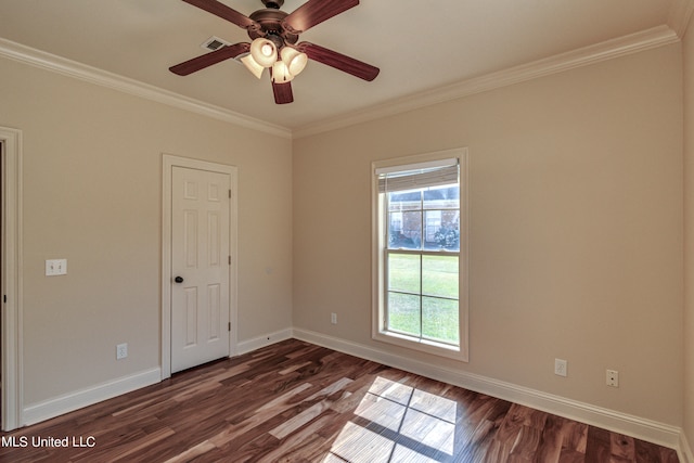 unfurnished room with crown molding, dark hardwood / wood-style floors, and ceiling fan