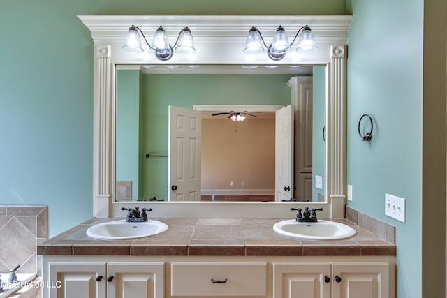 bathroom featuring vanity and ceiling fan